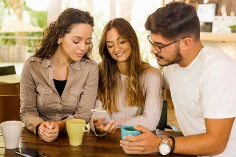 Friends at the cafe Stock Photos