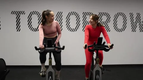 Friends chat during cycling workout Stock Footage 337114791