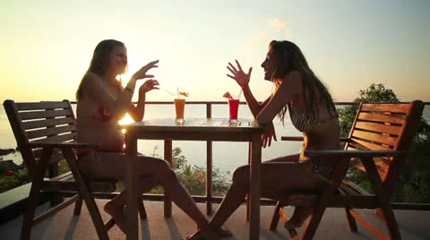 Friends chatting in sunset Stock Footage 22540221