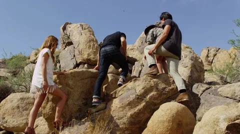 Friends climbing rocks Video stock 62344796