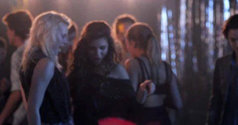 Friends Dancing And Drinking In Popular Disco Place Stock Footage 91129037