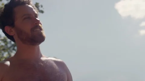 Friends dancing and having fun on a beach at the lake in the summer Stock Footage 116783185