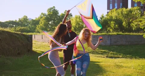 Friends dancing and having fun together whit LGBT Flag Stock Footage 278241447