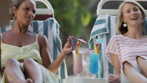 Friends dancing on deck chairs. Stock Footage 88368231