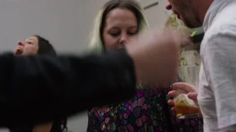 Friends dancing at a house party Stock Footage 58582007