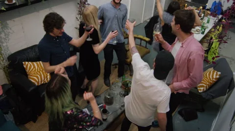 Friends dancing at a house party Stock Footage 58582053