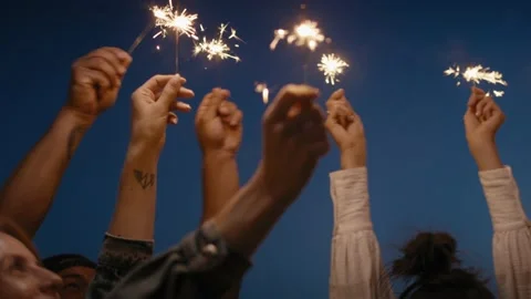 Friends dancing together at the rooftop with sparkles Stock Footage 203956776