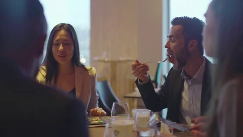 Friends dining together in restaurant Video stock 75169241
