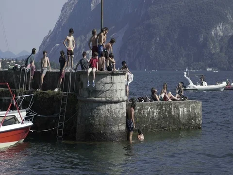 Friends Diving into a Lake Stock Footage 78071786