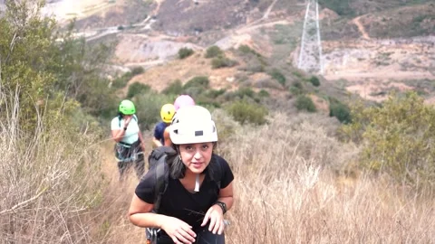 Friends do a Via Ferrata mountain climbing in Cartagena Stock Footage 242084598
