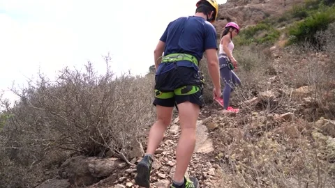 Friends do a Via Ferrata mountain climbing in Cartagena Stock Footage 242084781