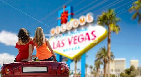 Friends driving in convertible car at las vegas Stock Photos