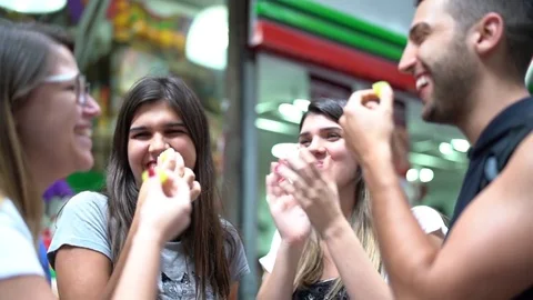 Friends Eating and Having Fun on Fruit Market Stock Footage 85280258