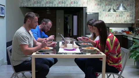 Friends eating supper and talking Video stock 36638141