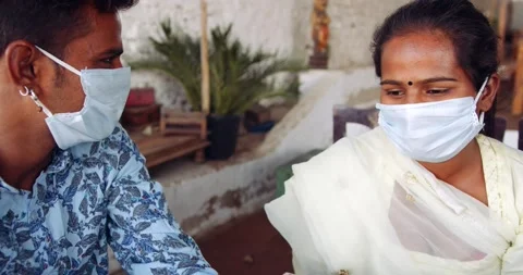 Friends in an empty bar restarant cafe with face masks Stock Footage 145117693