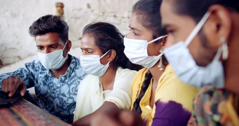 Friends in an empty bar restarant cafe with face masks Stock Footage 145117816
