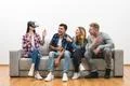 The friends fun with a virtual reality glasses on the white background Photo