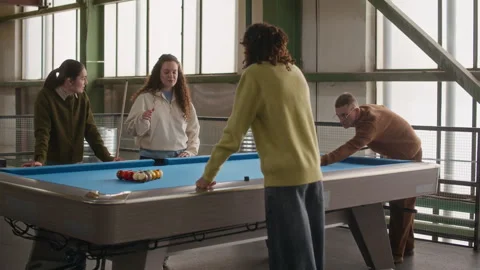 Friends Gathering around Pool Table to Start Game Stock Footage 332768149