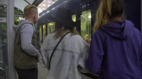 Friends get on the train together Stock Footage 54081616