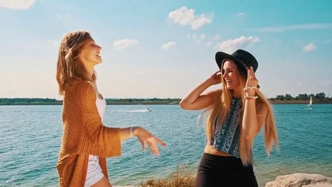 Friends girls partying and dancing at the beach Stock Footage 80533053