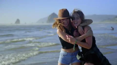 Friends greet at the beach Stock Footage 52559142