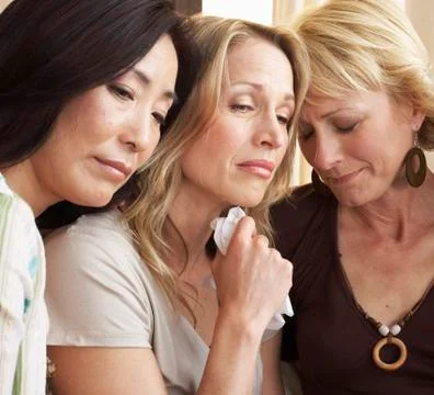 Friends Grieving Together Stock Photos