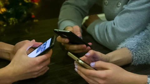 Friends hands with smartphones Stock Footage 60569339