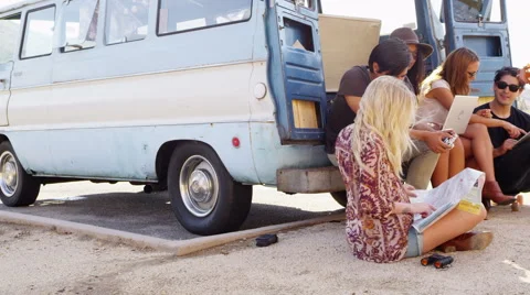 Friends hanging out by van Stock-Footage 62344944