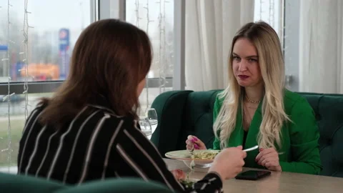 Friends having breakfast in a cafe Video stock 200842044