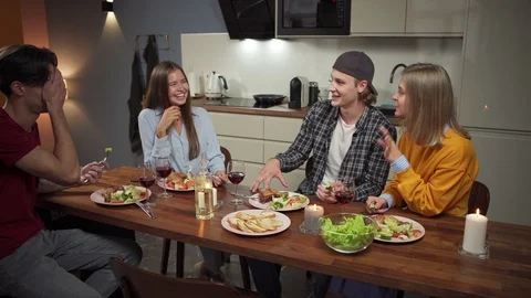Friends having dinner and talk Stock Footage 114808565