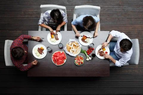 Friends having dinner Stock Photos