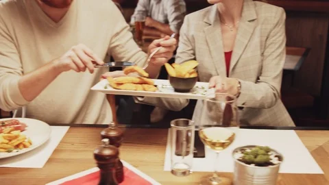 Friends having dinner at restaurant. Stock Footage 125080313