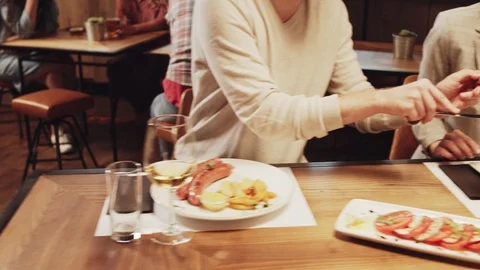 Friends having dinner at restaurant. Stock Footage 125084364