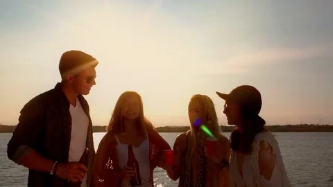 Friends having fun and drinking at the beach Stock Footage 80492158