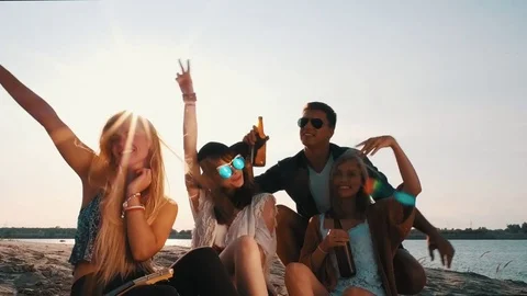 Friends having fun and enjoying beach festival Stock Footage 80492244