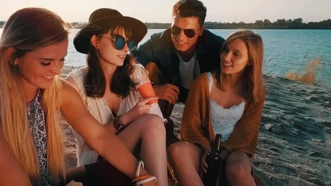 Friends having fun and enjoying beach festival Stock Footage 80492573