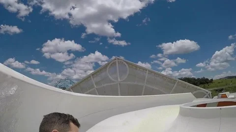 Friends having fun and sliding down in a water slide Video stock 72495539