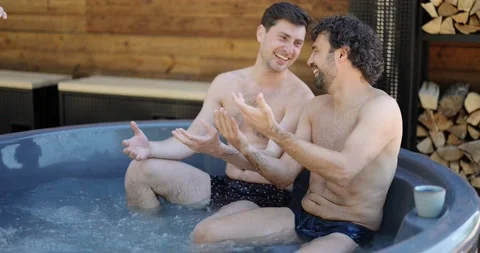 Friends having fun bathing at spa outdoors Stock Footage 154830339