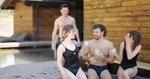 Friends having fun bathing at spa outdoors Stock Footage 154831046