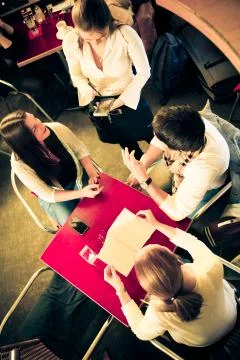 Friends Having Fun At A Cafe Stock Photos