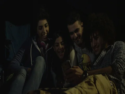 Friends having fun with mobile. Stock Footage 69475007