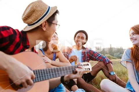 Friends having fun outdoors Stock Photos
