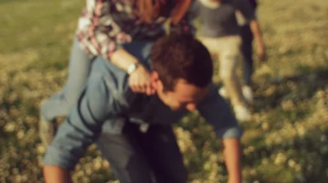 Friends having fun in the park Stock Footage 62777134