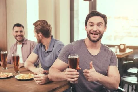 Friends having fun in pub Stock-Fotos