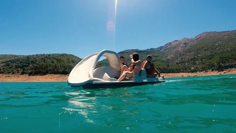 Friends having fun on summer at river on pedal boat Vídeos de archivo 279554533