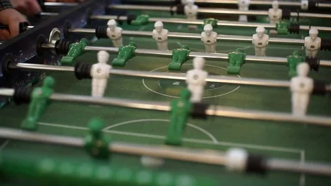 Friends having fun together playing table football. Stock Footage 69754021