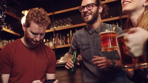 Friends having good time at pub. Stock Footage 125073399