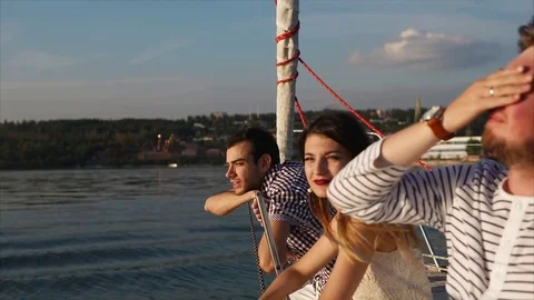 Friends having yacht cruise and enjoying nature scenes Stock Footage