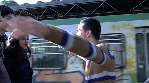 Friends hugging at the station Stock Footage 34273446