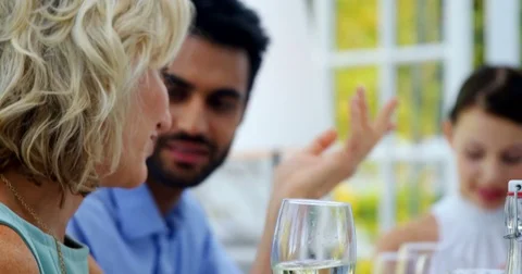 Friends interacting with each other whil... | Stock Video | Pond5
